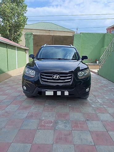 opel duman: Hyundai Santa Fe: 2 l | 2010 il Krossover — 2