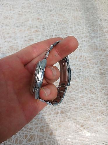 orient gence: Orient brendinin gümüşü rəngli polad bilərzikli qol saatı. Bu model — 4