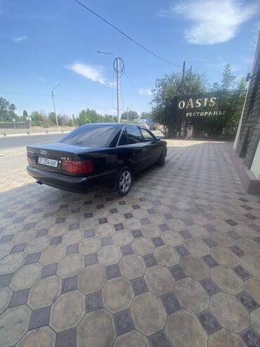 запчасти на ауди а4 цены: Черный седан Audi 100 (C4) с классическим дизайном. Модель 2.6 E, что