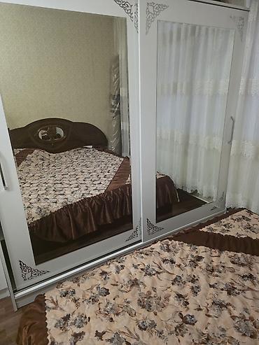 Yataq otağı mebel dəsti - Şkaf: Ağ rəngdə, sürgülü qapılar, iri