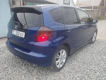 2 4 д: Honda Fit: 2009 г., 1.5 л, Вариатор, Бензин, Хэтчбэк — 7