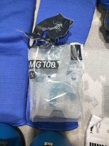 Спортивная форма: Форма для Тхэквондо размер кителя 36 . Капы не использованные — 5