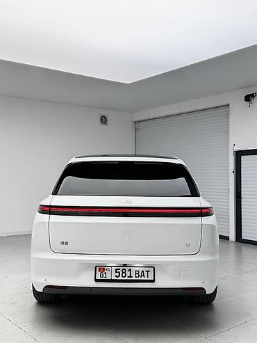 byd e2 2024: Lixiang L7: 2023 г., 1.5 л, Автомат, Гибрид, Кроссовер — 6