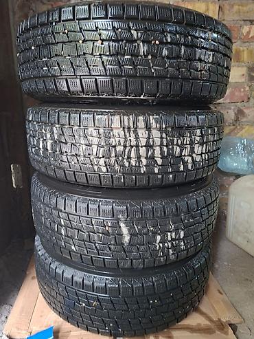 Шины и диски: Комплект зимних колес для кроссоверов/SUV. Состав: - Шины Goodyear — 9