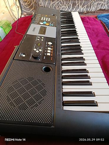 Синтезатор Yamaha PSR-E223 - Портативный клавишный инструмент с 61