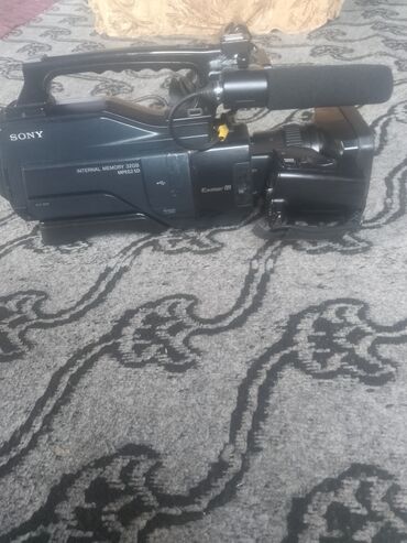 видеорегистратор с антирадаром: Sony peşəkar videokamera - Marka/model: Sony (peşəkar çiyinüstü tip)