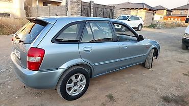 мазда mvp: Mazda 323: 2001 г., 1.6 л, Механика, Бензин, Универсал — 5