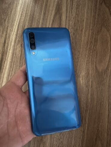 кинотеатр самсунг: Samsung Galaxy A50, 64 ГБ, цвет - Голубой, Отпечаток пальца, Две SIM карты, Face ID