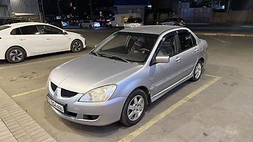 мотор на лансер: Mitsubishi Lancer: 2005 г., 1.6 л, Автомат, Бензин, Седан — 2