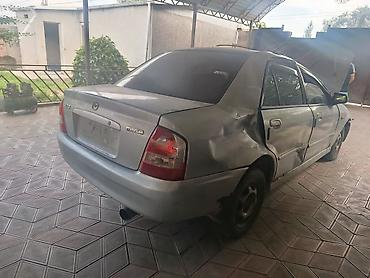 Mazda: Mazda 323: 2002 г., 1.6 л, Механика, Бензин, Седан — 5