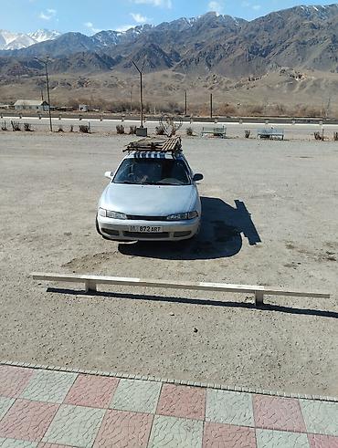 mazda 2000: Mazda Cronos: 1993 г., 1.8 л, Механика, Бензин, Хэтчбэк — 10