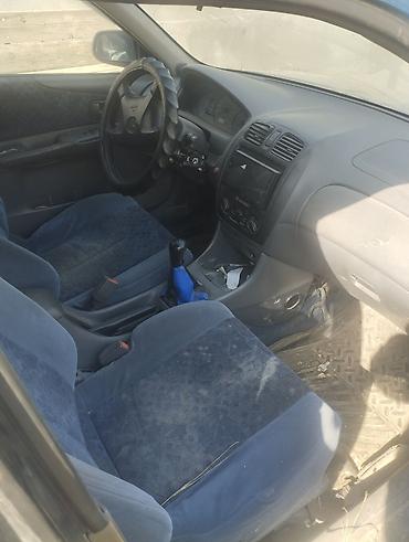 е 34 тарпеда сидения: Mazda 323: 2001 г., 1.6 л, Механика, Бензин, Универсал — 6
