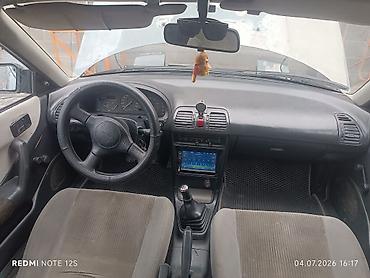 Mazda: Mazda 323: 1991 г., 1.6 л, Механика, Бензин, Хэтчбэк — 11