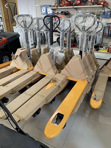 İstehsal avadanlığı: Alman brendi hochkraft transpaletlərin satışı. 2500 kg, 1 il zəmanət — 2