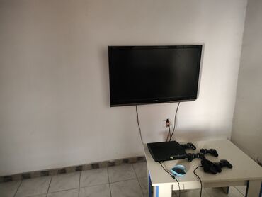 televizor 32 inch: PlayStation dəsti satılır 2400 manat PlayStation reklamı bahalı böyük