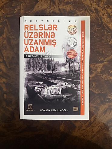 Məhsul: Kitab – “Relslər üzərinə uzanmış adam” Müəllif: Rövsən