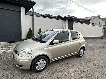 byd e1: Toyota Yaris: 2002 г., Автомат, Бензин, Хэтчбэк — 1