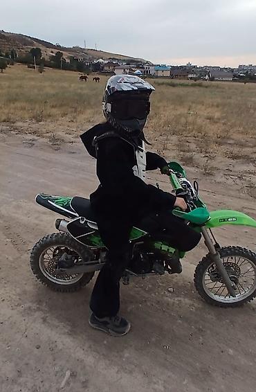 Kawasaki KX65 — компактный кроссовый мотоцикл для юных райдеров и