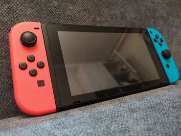 купить прошитую nintendo switch oled: Продаю Nintendo Switch 2 rev. В комплекте только консоль и joy con