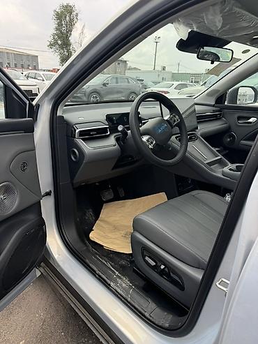 byd e1: Электромобиль Aion (кроссовер) Кузов и дизайн: - Современный — 4