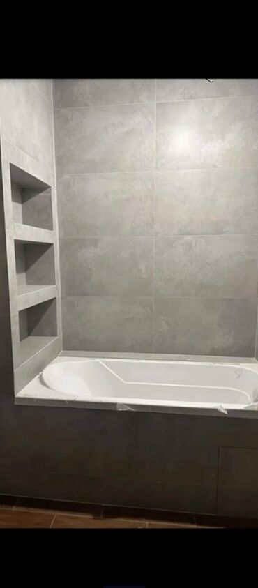 Укладка плитки: Услуги по облицовке ванных комнат и душевых плиткой/керамогранитом под — 24