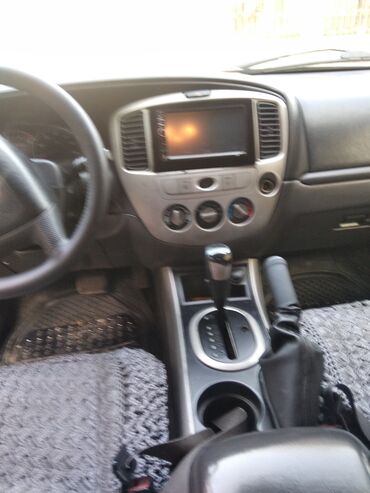 Mazda: Mazda Tribute: 2.3 l | 2004 il Ofrouder/SUV — 12