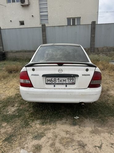 продаю авто в аварийном состоянии: Mazda Familia: 1998 г., 1.5 л, Типтроник, Газ, Седан