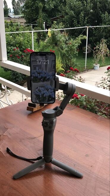 осмо камера: Электронный стабилизатор для смартфона DJI OM 4 SE, выполненный в