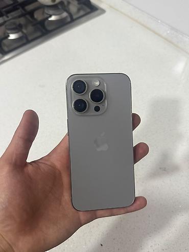 iphone xe: IPhone 15 Pro, 128 GB, White Titanium, Face ID — 1