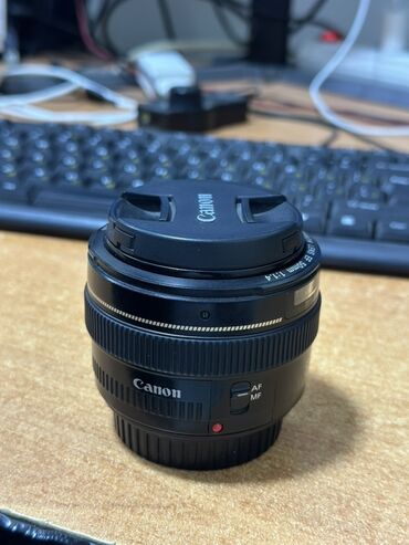 объектив 55250: Объектив Canon 50mm f/1.4 USM черного цвета, предназначенный для