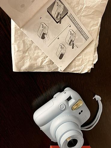 мереке видео: Fujifilm Instax mini 12 — мгновенная камера в цвете Pastel Blue — 4