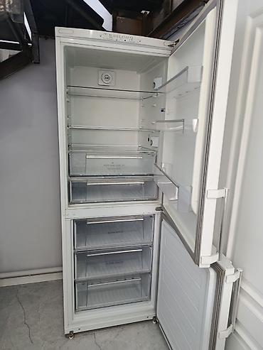 Холодильник Hotpoint Ariston, Б/у, Двухкамерный, De frost (капельный), 70 * 195 * 70