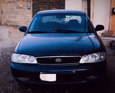 заводские тонированные стекла: Kia Sephia sedan - Kuzov: 4 qapılı sedan, tünd yaşıl rəng - Ön hissə