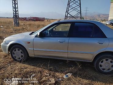 forester 2004: Mazda Familia: 2000 г., Бензин, Седан — 2