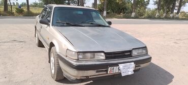 прцеп авто: Mazda 626: 1989 г., 2.1 л, Механика, Бензин, Седан