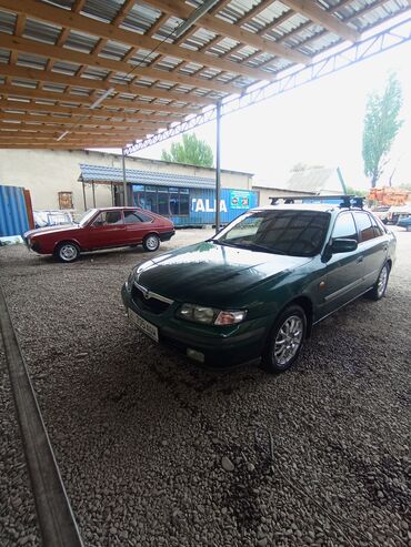 урулган машына: Mazda 626: 1997 г., 1.8 л, Механика, Бензин, Хетчбек