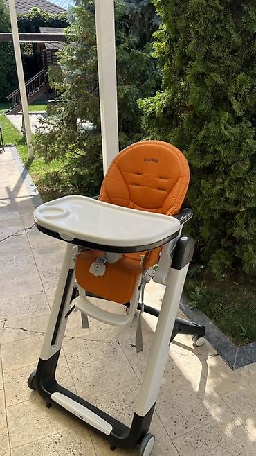 анатомия: Стульчик для кормления, Б/у, Peg perego, Трансформер, цвет - Оранжевый, Платная доставка — 1