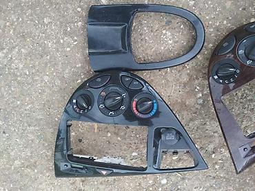 prodaj: CENTRALNA KONZOLA MAHAGONI ZA FORD FOCUS OD 1998. DO 2004. GOD. | — 1