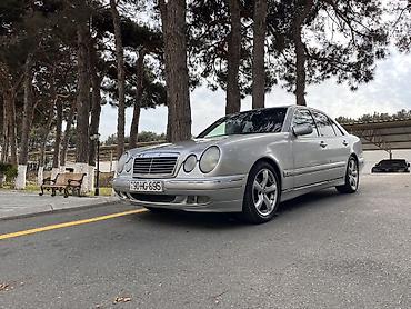 kuzu: Mercedes-Benz E-Class (W210) sedan, gümüşü rəng. - Kuzov: 4 qapılı — 7