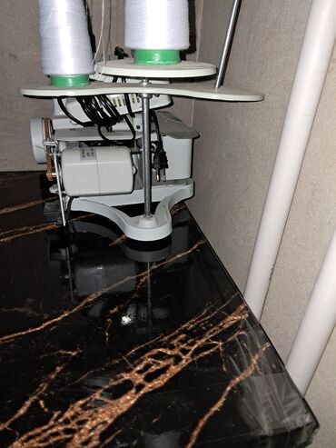 par vuran: Sənaye tipli overlok tikiş maşını - 3 iplikli overlok sistemi