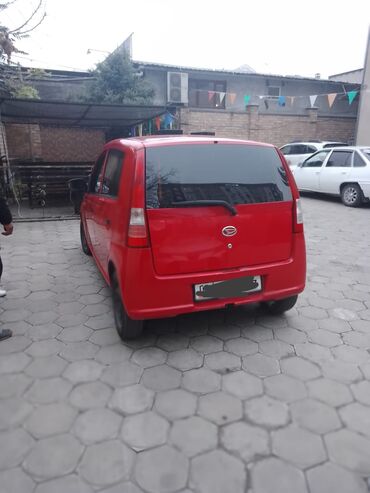 авто легковой: Daihatsu Cuore: 2005 г., 1 л, Автомат, Бензин, Хэтчбэк