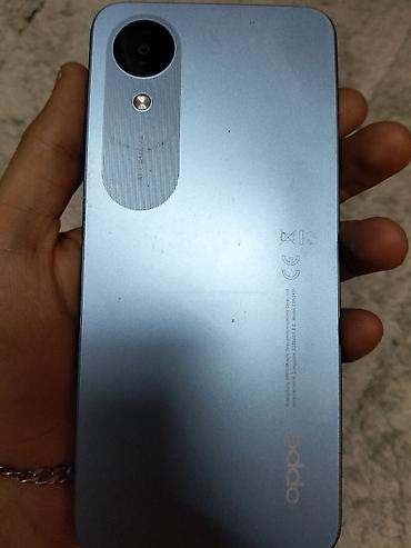 apple iphone 7: Oppo A18, 64 GB, rəng - Göy, Barmaq izi — 2