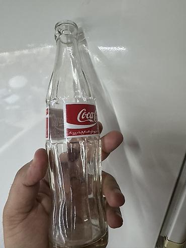 gürcü xengeli: Məhsul: Şüşə Coca‑Cola butulkası Təsvir: - Həcm: 0.25 L (etiketdə — 4