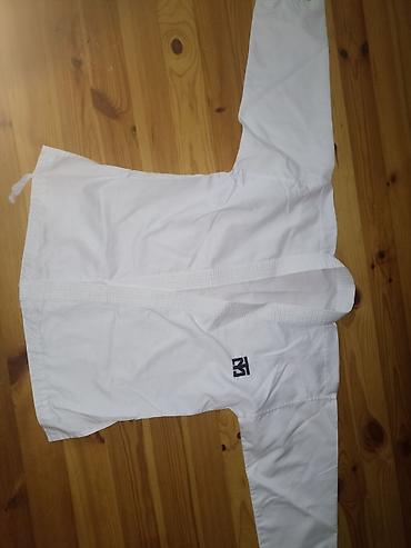 Другая верхняя одежда: Ağ rəngli döyüş karate geyimi üst hissəsi (gi/kurtka). - Material — 1