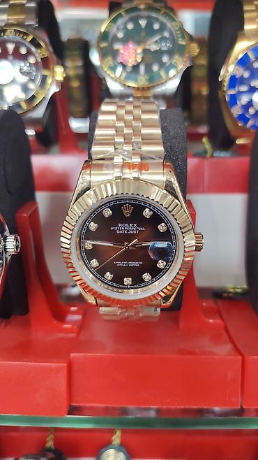 3d saat: Rolex üslubunda klassik qol saatları. Şəkillərdə bir neçə fərqli model — 3