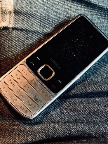 telefon sumqayıt: Nokia 6700 Slide