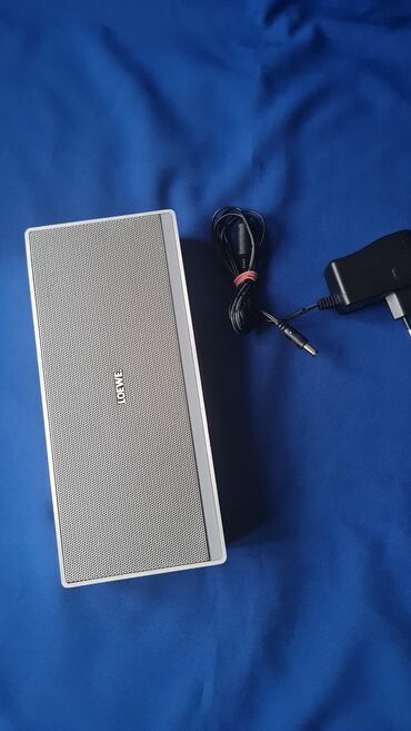 Zvučnici, slušalice i mikrofoni: Loewe Speaker 2go – prenosni Bluetooth zvučnik sa punjačem - — 3