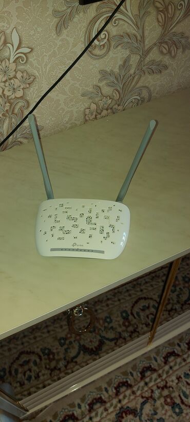 wifi adapter: Tp-link modem. işlənmiş. əla vəziyyətdədir. kabelləri və adaptoru da