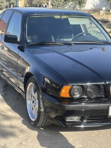 порог е34: BMW 5‑Series E34, черный седан 4.0 м60б40 Классический представитель