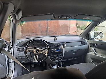 Daewoo: Daewoo Gentra: 1.6 l | 2014 il — 8